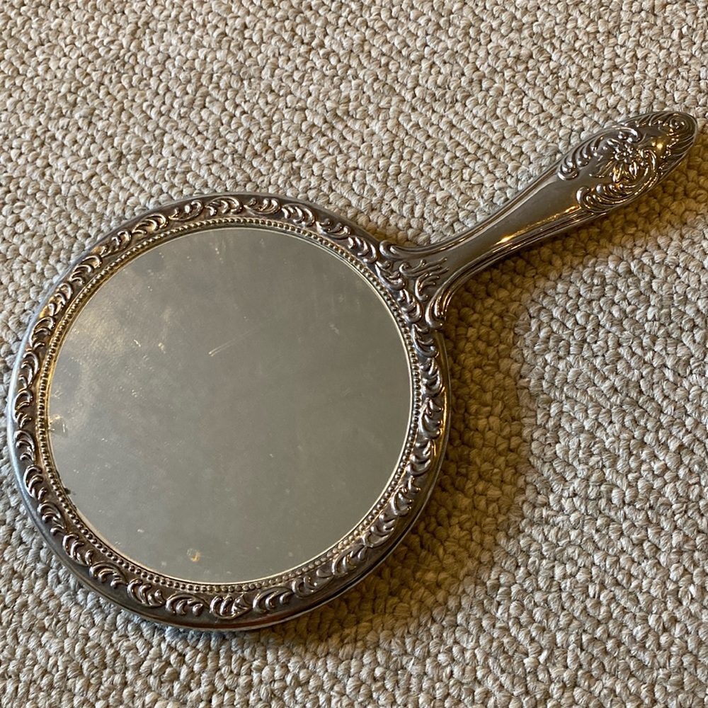 Vintage silver plate vanity hand mirror